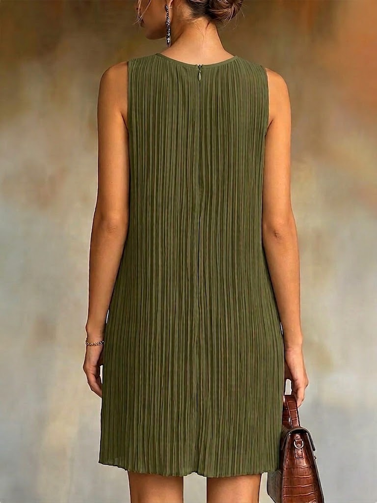 Stylish And Elegant Pleated Dress Featuring Bead-accented Paneling.